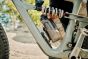 a-cyclist-removing-the-fidlock-bottle-from-a-bike-frame