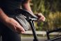 fidlock-saddle-bag-in-cyclists-hand